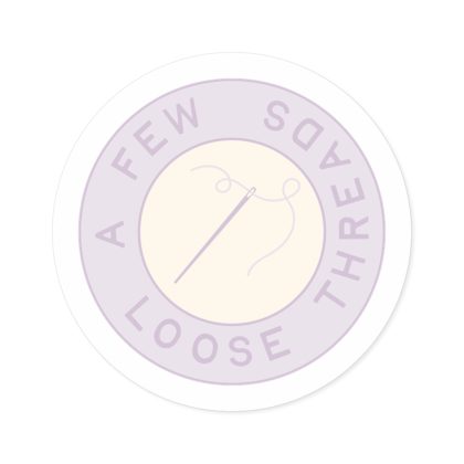 Purple A Few Loose Threads Round Sticker